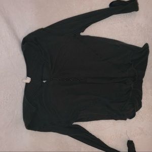 green sweater w open back